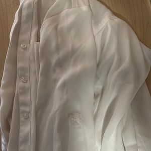 I’m selling a white see through button up. It comes from Maurice’s.